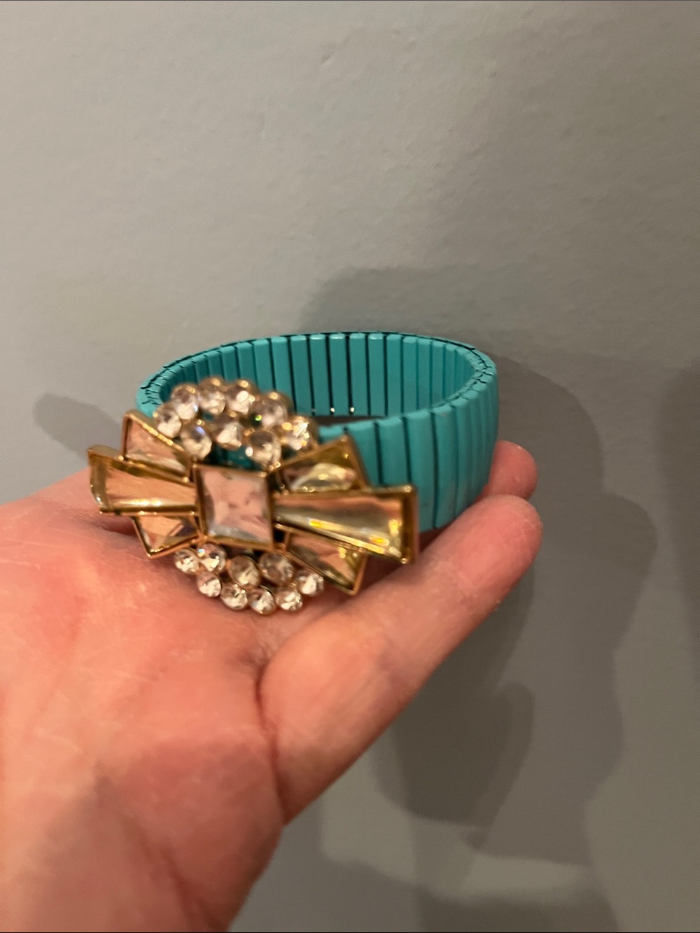 Turquoise Stretch Bracelet with Gold Bow and Crystal Accent